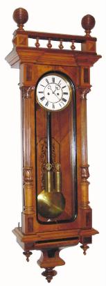 C.1880, Austrian, 2-Weight Vienna Regulator, in a walnut case with carved columns and inlaid backboard. — Antique Clocks Price Guide