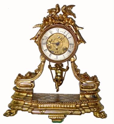 C.1890, French, Swinging Doll clock, in a gilt spelter case, 8-day striking. — Antique Clocks Price Guide