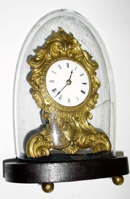 C.1850, Jerome Botsford "Paris"; model shelf clock, balance wheel with embossed brass facade and porcelain dial. — Antique Clocks Price Guide