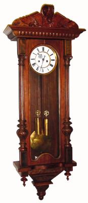 C.1886, German, Gustav Becker, 2-Wt, Vienna Regulator, serial No. 583751, in a walnut case with carved half columns to the side. — Antique Clocks Price Guide