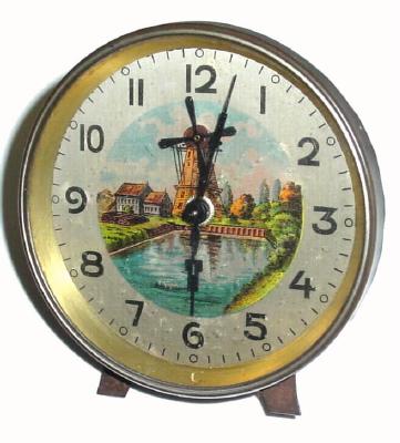 C.1920, German, small desk clock with animation on dial. — Antique Clocks Price Guide