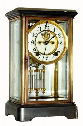 C.1905, Jennings Brothers, Chicago, logo on an Ansonia "Crystal" brass and glass clock. — Antique Clocks Price Guide