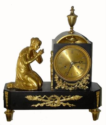 C.1830, French, Bronze and Ormolu figural mantel clock, a lady kneeling and praying. — Antique Clocks Price Guide