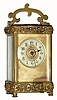 C.1900, French, Brass Cased timepiece carriage clock in a Doucine case. 