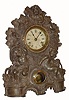C.1860, Waterbury Clock Co., 8-day time/strike iron front mantel clock. "Children play in the grape vines" case marked 49 was made by N. Muller, NY (signed with name in the casting, patent 1856). 