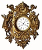 C.1890, French, Gilt Cast Iron Wall clock, the movement probably from another clock as it is a bit too deep for the case, and is held into the iron casting by 2 wood screws forced into the brass bezel. 