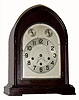 C.1923, Ansonia Clock Co., "Sonia No. 4", 8-day time/strike Westminster chime clock, with arched silvered dial with raised bronze numerals and subsidiary dials for F/S and chime/silent. 