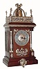C.1890, French, Architectural Table Clock, with nickeled brass trim and a large bell at top, walnut case. 