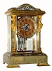 C.1900, French, Onyx, Marble and Ormolu 4-glass crystal regulator with mercury pendulum, and multi color enameling on the base, side columns dial center, bezel and pendulum. 