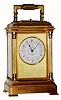 C.1900, French, Drocourt, for Tiffany and Co., brass cased carriage clock, reeded column case, time, strike and repeat, and with multi color dial. 