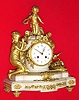 C.1890, French, Marti and Cie, for Tiffany: 8-day time/strike figural mantel clock, ormolu and white marble. 