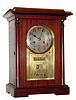 C.1910 German, mahogany automatic calendar clock, 8-day time and gong strike, case with Art Deco influence, brass dial surround and brass sleeves on the columns. 