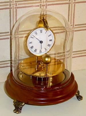 C.1975, Briggs Repro by Terwilliger's Clock Trade Enterprises, Bronxville, New York, 8-day rotary pendulum clock with original dome. — Antique Clocks Price Guide