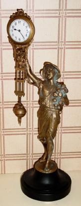 C.2001, Classical Clock Co., California, Reproduction swinging arm clock, THE ONION BOY. — Antique Clocks Price Guide