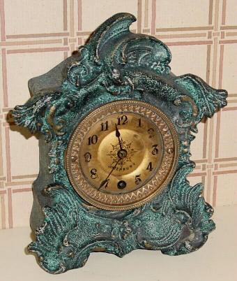 C.1890, Waterbury Clock Co., Cast Iron case, 8-day time and strike in the French style. — Antique Clocks Price Guide