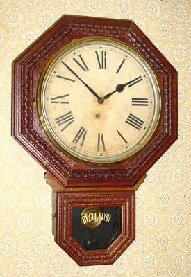 C.1915, E. Ingraham and Co.,12 INCH DROP OCTAGON, in a pressed oak case, 8-day time only. — Antique Clocks Price Guide