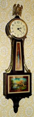 C.1925, Waltham Watch Co., Mini Lever Banjo, stem wind, 8-day movement, with castle and fisherman tablet set. — Antique Clocks Price Guide
