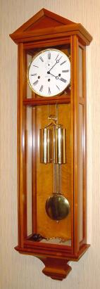 C.2001, German, Hermle and Sohn, Modern Chiming Laterndluhr, in a linden case with thin dark walnut accent strip. Time train is weight driven. — Antique Clocks Price Guide
