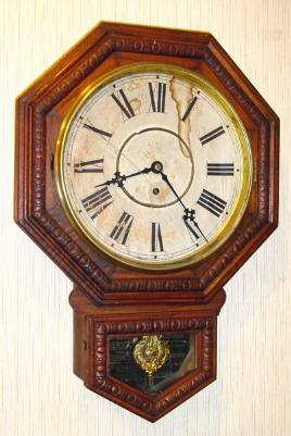 C.1910, Waterbury Clock Co., 12 INCH DROP, pressed oak octagon top school clock, 8-day time only. — Antique Clocks Price Guide