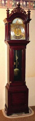Mixed Lot: C.1888, E. Howard, No. 81 mahogany tall case, now with a converted E Howard master clock movement (like No. 1, but with circular cut outs in the front plate.), one weight, 8-day with rocking ship. — Antique Clocks Price Guide