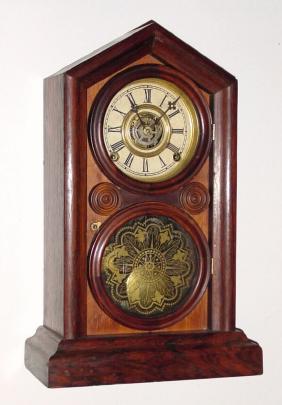 C.1880, E. Ingraham and Co., "Doric", 8-day time/strike/alarm shelf clock. — Antique Clocks Price Guide