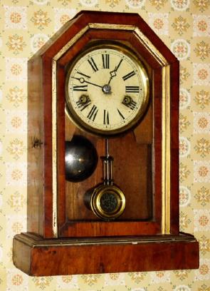 C.1900, German, Walnut Cottage clock, 1-day, time and strike on a bell. — Antique Clocks Price Guide