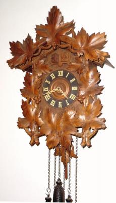C.1900, German, large 30-hour cuckoo and quail quarter striking wall clock. — Antique Clocks Price Guide