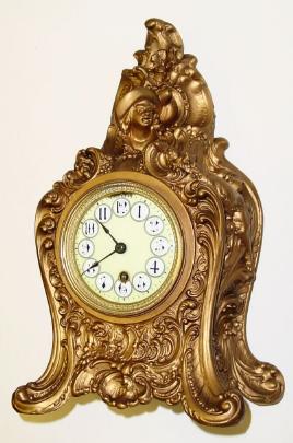 C.1895, Boston Clock Co., Rip Van Winkle, 8-day tandem wind mantel clock with fancy porcelain dial with raised Arabic numerals, white circles on an ivory background. — Antique Clocks Price Guide