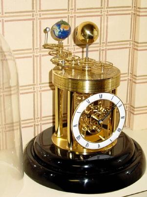 C.2002, German, Franz Hermle, Orrery clock under dome, with annual calendar and signs of the Zodiac, battery operated, change battery yearly. — Antique Clocks Price Guide
