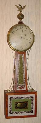 C.1815, Attributed to Simon Willard, Boston banjo, 1-weight, 8-day, with step train, T-bridge movement held in place with original fillister screws. — Antique Clocks Price Guide