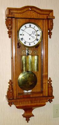 C.1865, Austrian, 3-Wt Dwarf, Grand Sonnerie, oak case, with full size 7" dial and short drop pendulum. — Antique Clocks Price Guide