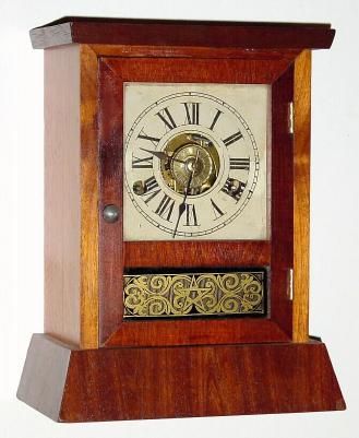 C.1870, Seth Thomas Clock Co., "Cottage D", 30-hour time/strike/alarm cottage clock, chisel base. — Antique Clocks Price Guide