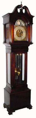 C.1920, Colonial Mfg Co., Zeeland, MI Model 1095, 9-tube, 3-tune, rolling moon, 3-weight tall clock in Honduras mahogany. — Antique Clocks Price Guide