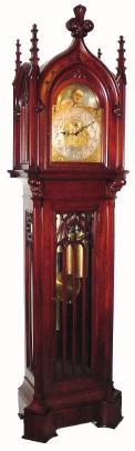 C.1900, American Case, 9-tube, 3-weight, two chime mahogany hall clock, Gothic style, for Fred Bucher and Sons, Baltimore (engraved on dial). — Antique Clocks Price Guide