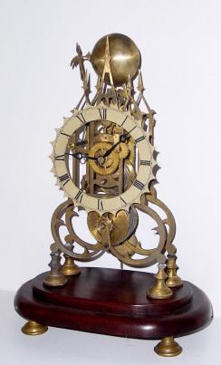 C.1900, English, Skeleton Clock, chain fusee with passing strike on the hour. — Antique Clocks Price Guide