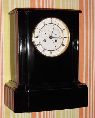 C.1890, Marti and Cie, 8-day time/strike black marble calendar clock, day, date and month. — Antique Clocks Price Guide