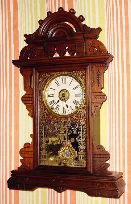 C.1880, Seth Thomas Clock Co., "Eclipse", 8-day time/strike/alarm walnut shelf clock. — Antique Clocks Price Guide