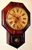C.1901, Ansonia 12 Inch Drop Octagon, rosewood veneer, 8-day timepiece.