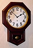 C.1900, New Haven Clock Co, Short Drop oak school clock, time only, 8-day.