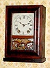 C.1870, Terry Clock Co., Waterbury, Conn., 30-hour time/strike reverse OG cottage clock.