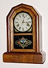 C.1879, Wm. L. Gilbert, COMET, 30-hour time and strike mahogany veneer shelf clock.
