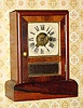 C.1870, Seth Thomas Clock Co., "Cottage E", 30-hour time/alarm cottage timepiece.