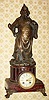 C.1890, Le Roy, French, 8-day time/strike red marble mantel clock with a modern oriental figure.