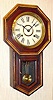 C.1905, Japan, Mini 8-day School Clock, in a faux grained drop octagon case.