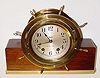 C.1930, Seth Thomas, No. 8 Mayflower, Ships bell mantel clock, ships wheel bezel, mounted to original mahogany block with brass base.