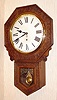 C.1911, New Haven Clock Co., BRANFORD, highly embossed short drop octagon in oak.
