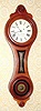C.2000, Wayne R. Cline, Bowling Green, KY, mini No. 9 regulator (figure 8), in cherry, with 8-day lever movement.