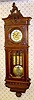 C.1900, Austrian, 3-Wt Grand Sonnerie, Second baroque walnut cased wall clock, with Art Nouveau decorations on the dial center, weights and pendulum. Full quarter strike on rods.