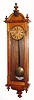 C.1900, Ansonia Clock Co., CAPITOL, oak cased, double spring, time only wall clock, 8-day.