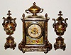 C.1890, French for Schneider and Co., Union Square, NY 3-piece mantel garniture, gilt brass and porcelain, with hand painted flowers and birds.